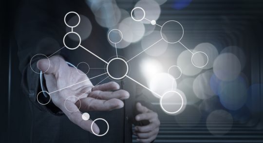 businessman-hand-showing-blank-flow-chart-on-new-modern-computer-as-concept-with-bokeh-exposure